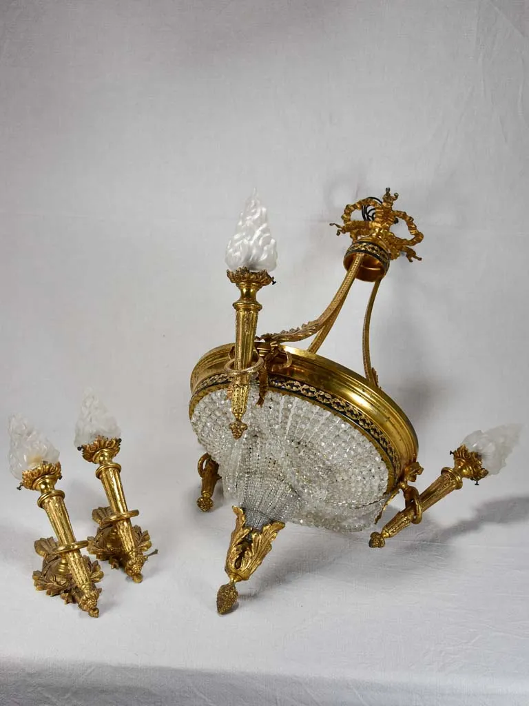 Early twentieth century torch chandelier with matching pair of wall sconces