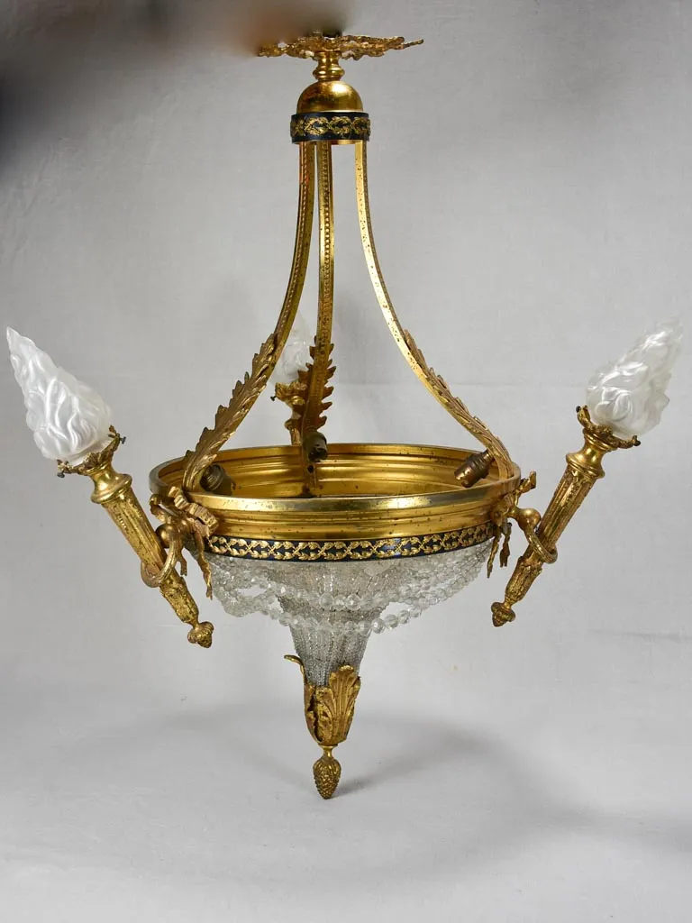 Early twentieth century torch chandelier with matching pair of wall sconces